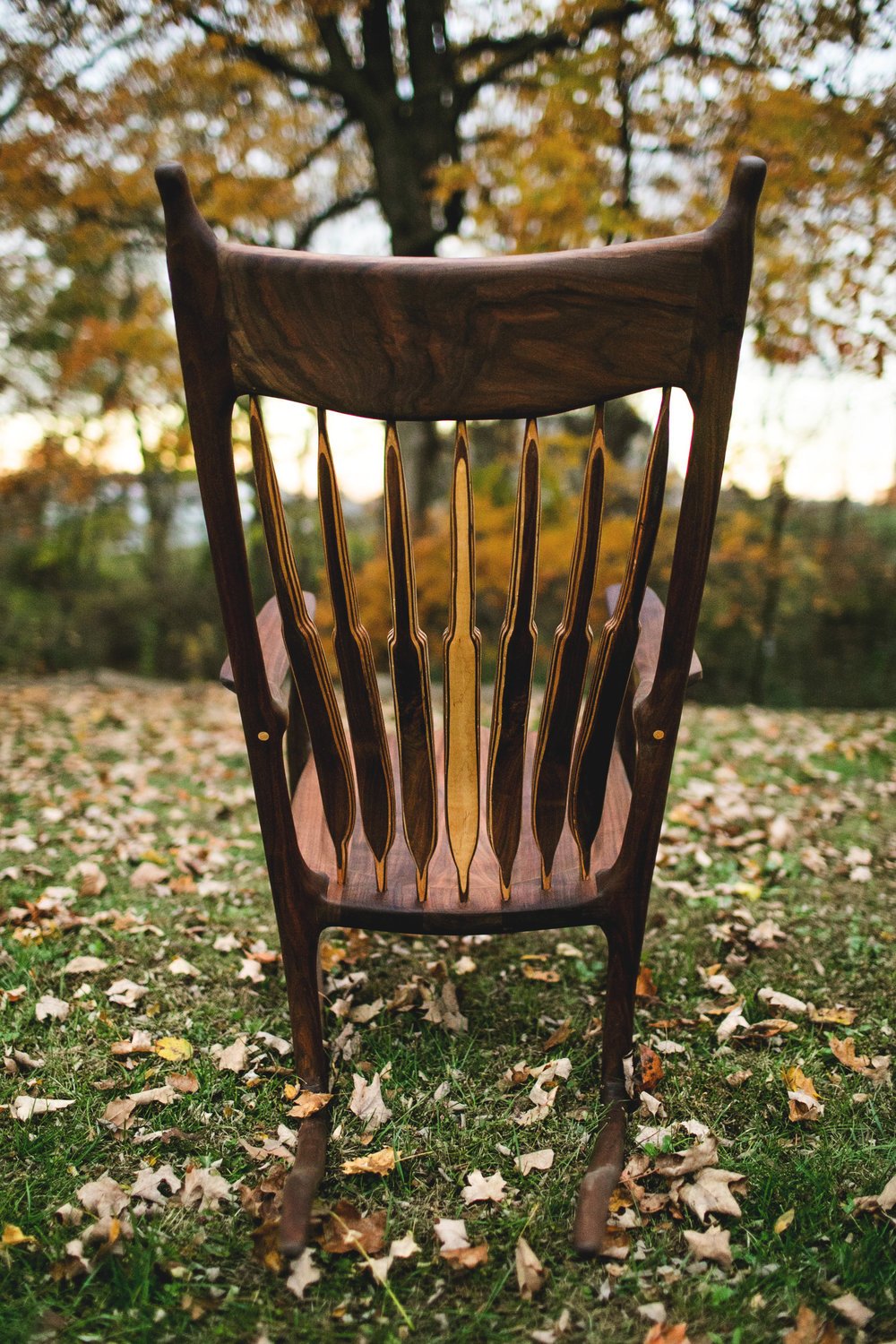 A replica of the maloof rocker made from a beautiful slab of wood.