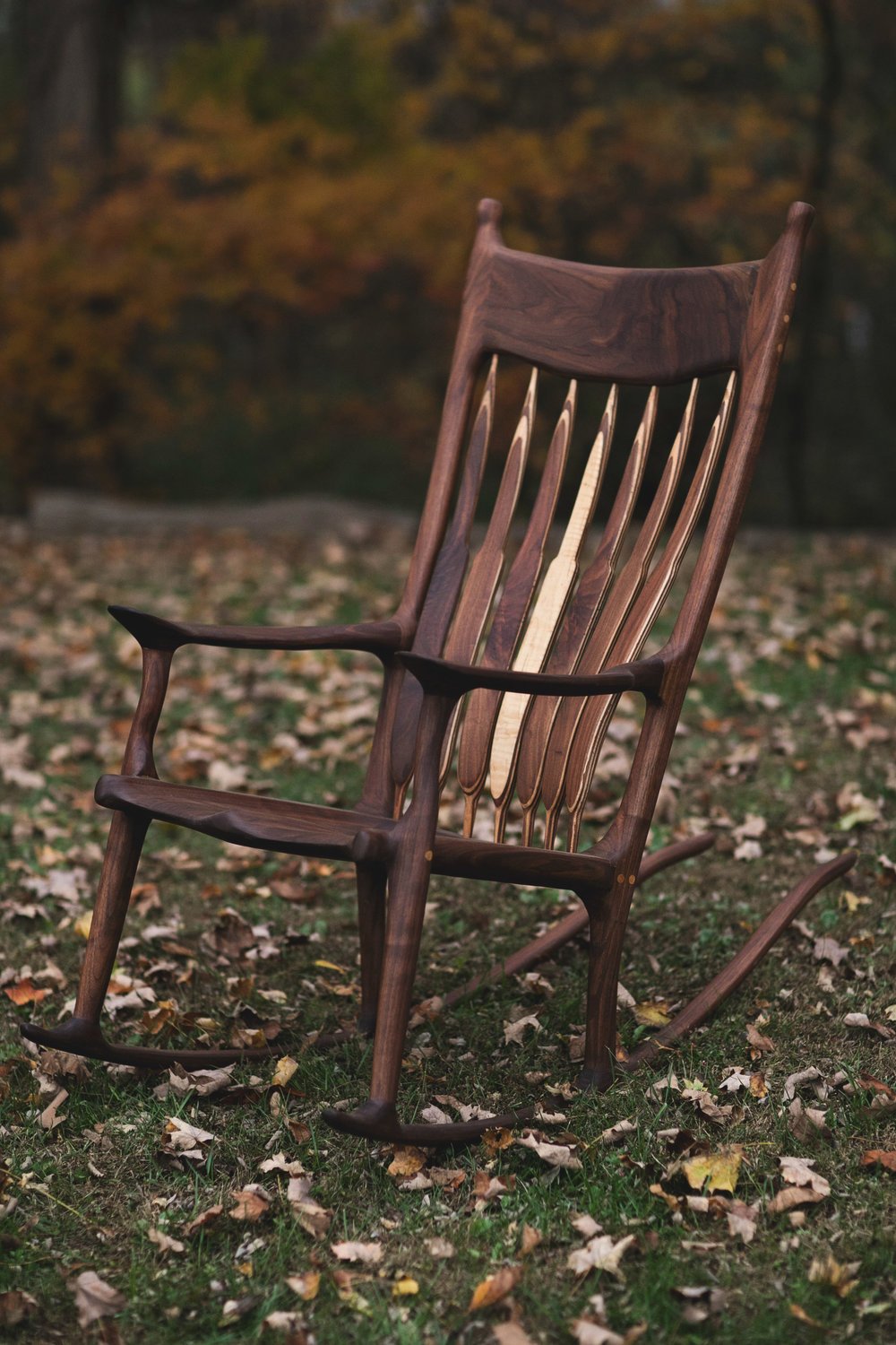 A replica of the maloof rocker made from a beautiful slab of wood.