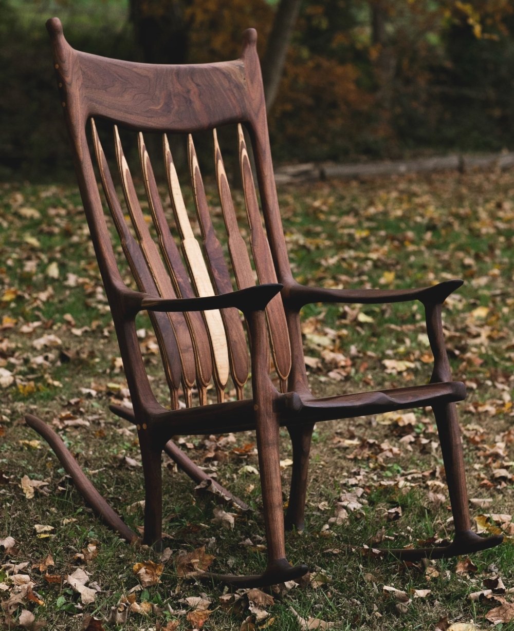 A replica of the maloof rocker made from a beautiful slab of wood.