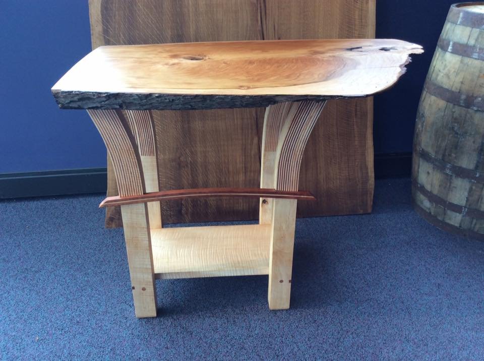 This custom live edge end table is perfect for a living room or bedroom.