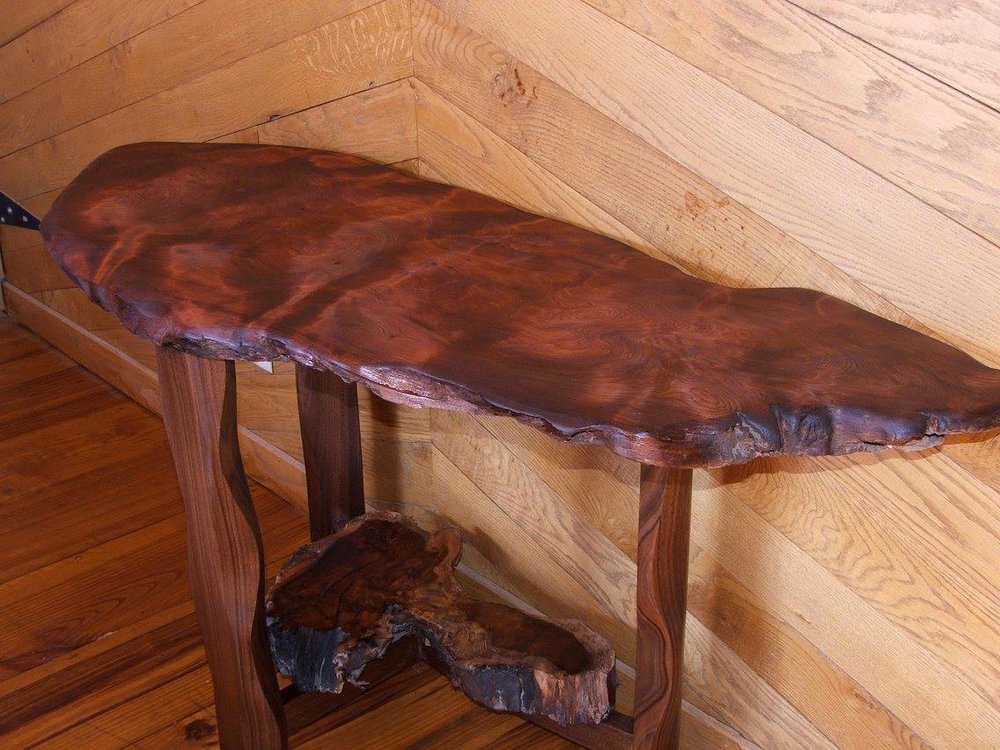 This beautiful Custom piece of live wood furniture was made custom for a family.